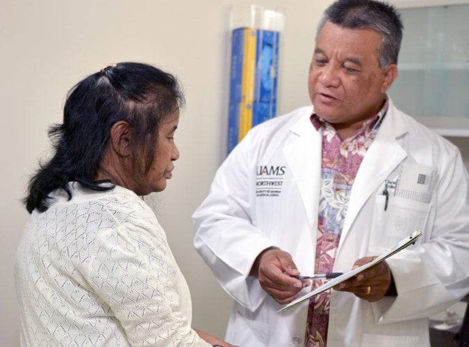 Doctor consulting with a patient.